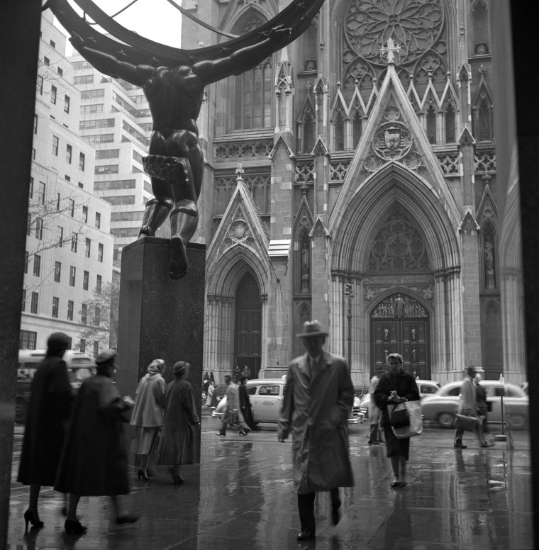 This shot, taken on a rainy day across from St. Patrick's Cathedral, is one of thousands of snaps found in an attic in 2009. After his two sons left home, Frank Larson found more time to fulfill his passion for picture-taking.  <br><br>
The thousands of negatives discovered, according to the Queens Museum of Art, were organized into more than 100 envelopes onto which Larson had carefully noted the locations, dates and times they were taken.